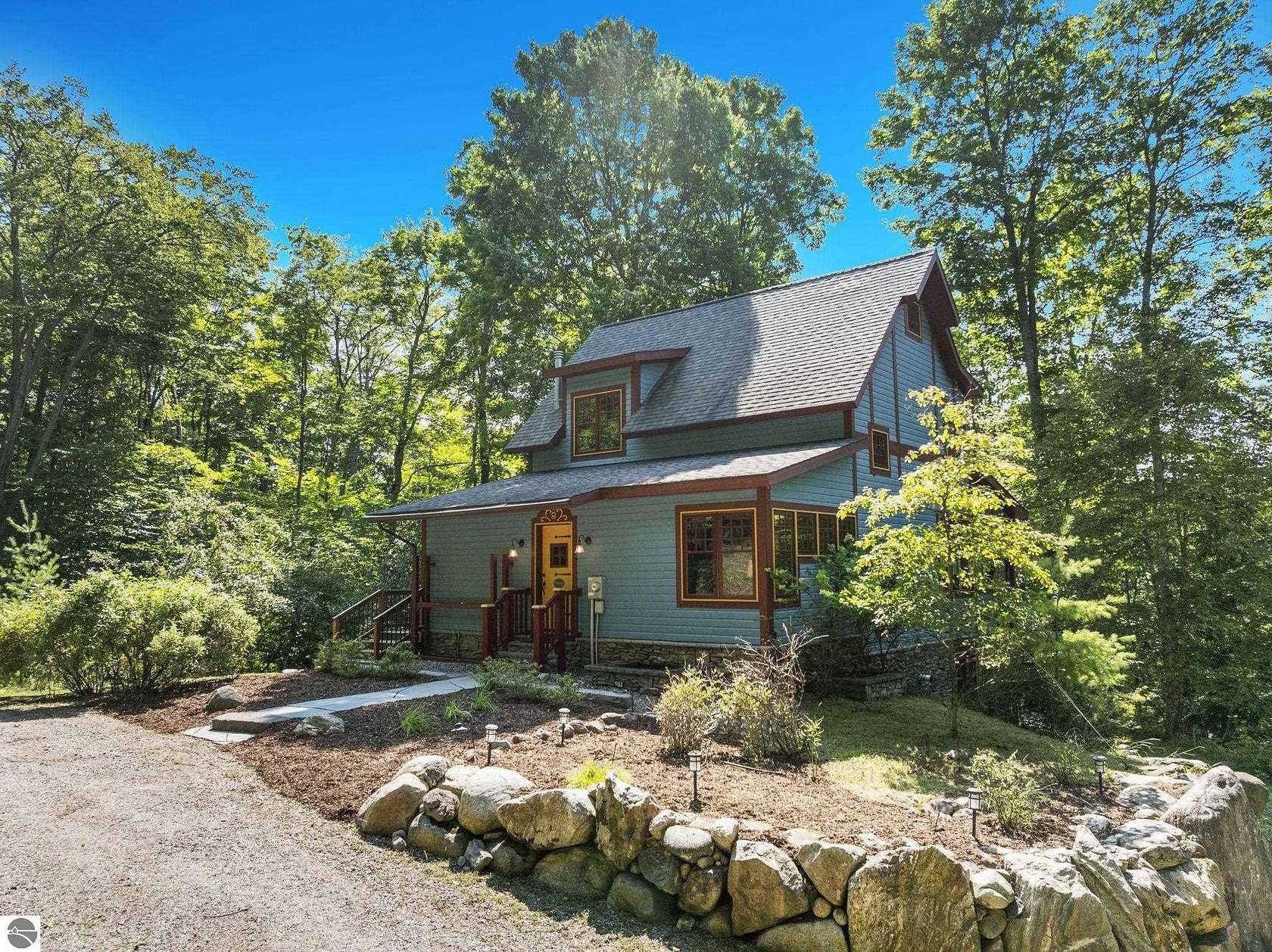 6.4 Acres of Land with Home for Sale in Bellaire, Michigan