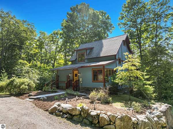 6.4 Acres of Land with Home for Sale in Bellaire, Michigan