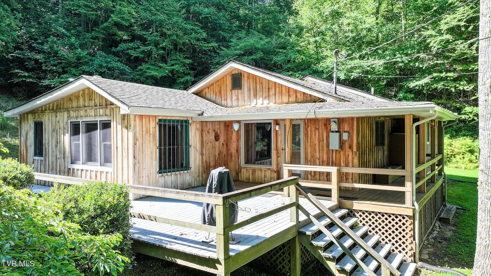 7.34 Acres of Land with Home for Sale in Hampton, Tennessee