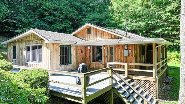 7.34 Acres of Land with Home for Sale in Hampton, Tennessee