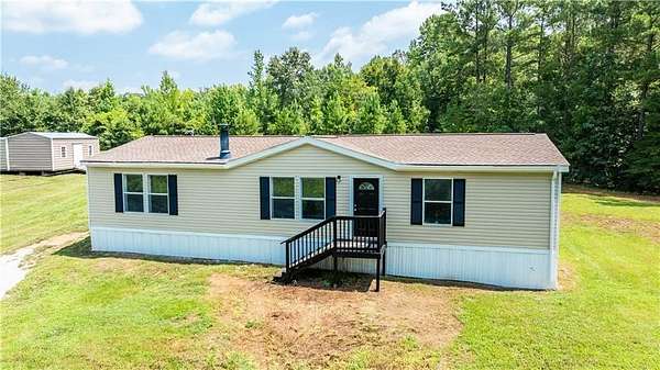 2.79 Acres of Land with Home for Sale in Opelika, Alabama