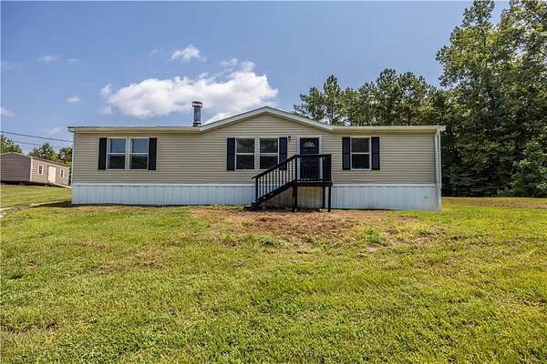 2.79 Acres of Land with Home for Sale in Opelika, Alabama