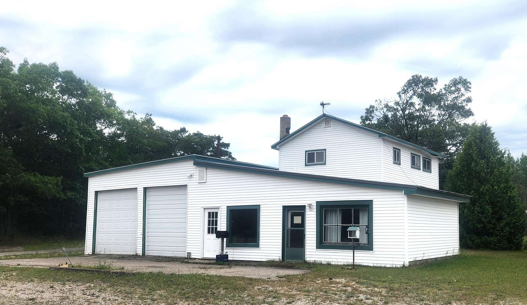 1.56 Acres of Improved Mixed-Use Land for Sale in Ocqueoc, Michigan