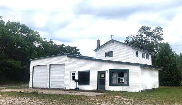 1.56 Acres of Improved Mixed-Use Land for Sale in Ocqueoc, Michigan