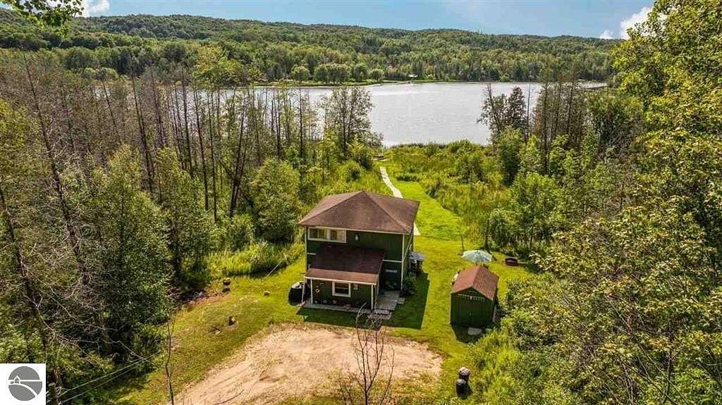 6.2 Acres of Land with Home for Sale in East Jordan, Michigan