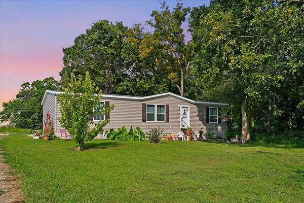 22.5 Acres of Land with Home for Sale in Aldrich, Missouri