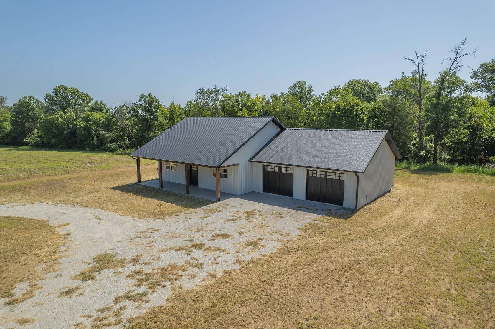 41.3 Acres of Recreational Land with Home for Sale in Nevada, Missouri