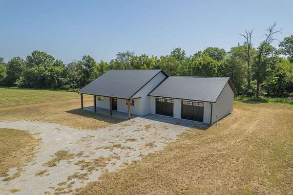 41.3 Acres of Recreational Land with Home for Sale in Nevada, Missouri