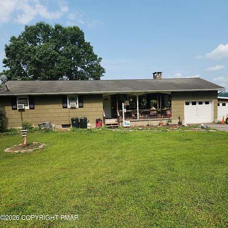 4 Acres of Land with Home for Sale in Gilbert, Pennsylvania