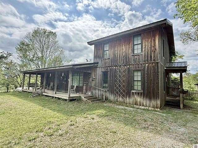 11.9 Acres of Land with Home for Sale in Eddyville, Kentucky