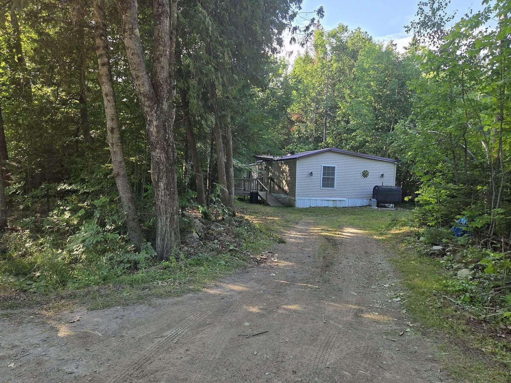 8 Acres of Land with Home for Sale in Charleston, Maine