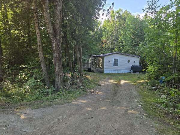 8 Acres of Land with Home for Sale in Charleston, Maine