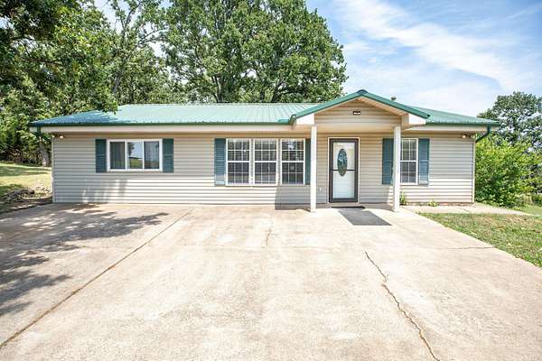 5 Acres of Land with Home for Sale in Berryville, Arkansas