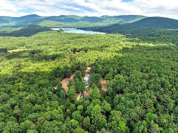53 Acres of Recreational Land with Home for Sale in Alton, New Hampshire