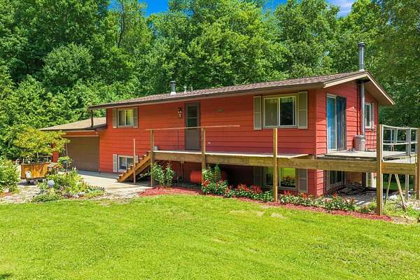 6.76 Acres of Land with Home for Sale in Knapp, Wisconsin