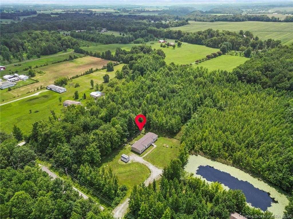 7.62 Acres of Land with Home for Sale in New Washington, Indiana