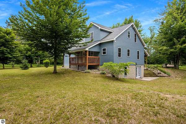 15 Acres of Recreational Land with Home for Sale in Thompsonville, Michigan