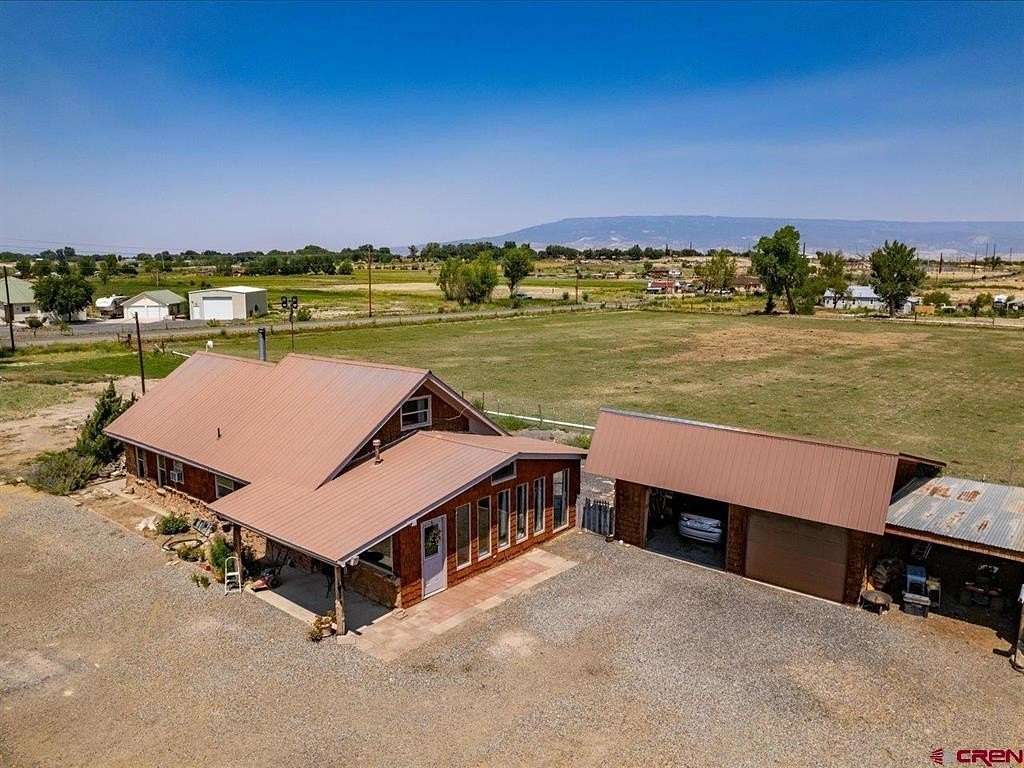 14.7 Acres of Land with Home for Sale in Delta, Colorado