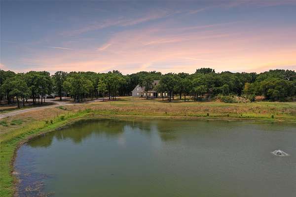 12.6 Acres of Land with Home for Sale in Aubrey, Texas