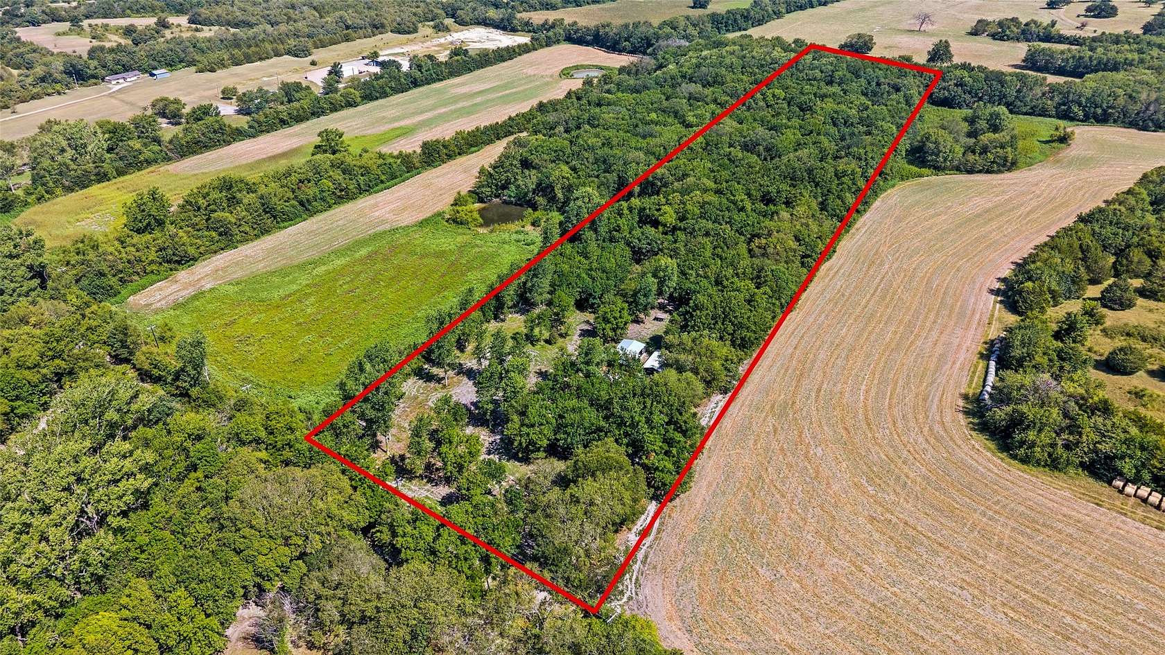 10 Acres of Land with Home for Sale in Tom Bean, Texas