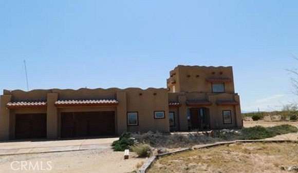 4.3 Acres of Land with Home for Auction in Joshua Tree, California