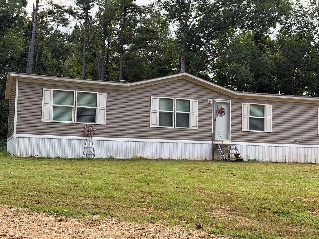 5 Acres of Land with Home for Sale in Grenada, Mississippi