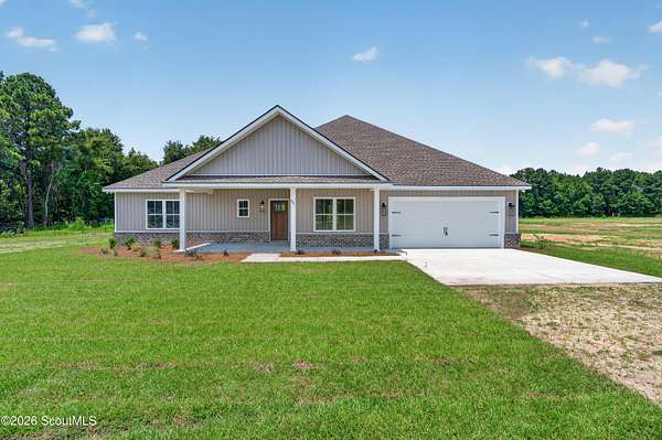 6.43 Acres of Land with Home for Sale in Ludowici, Georgia
