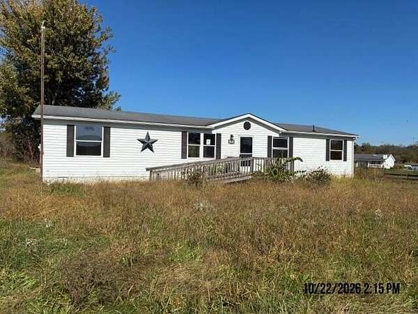 7 Acres of Land with Home for Sale in Eminence, Kentucky