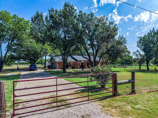 4.67 Acres of Land with Home for Sale in Brashear, Texas
