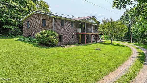 72.6 Acres of Agricultural Land with Home for Sale in Chuckey, Tennessee