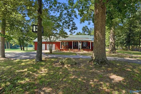 50.2 Acres of Land with Home for Sale in Dutton, Alabama