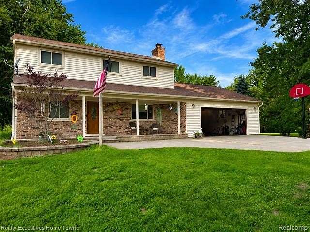 2 Acres of Land with Home for Sale in Columbus Township, Michigan