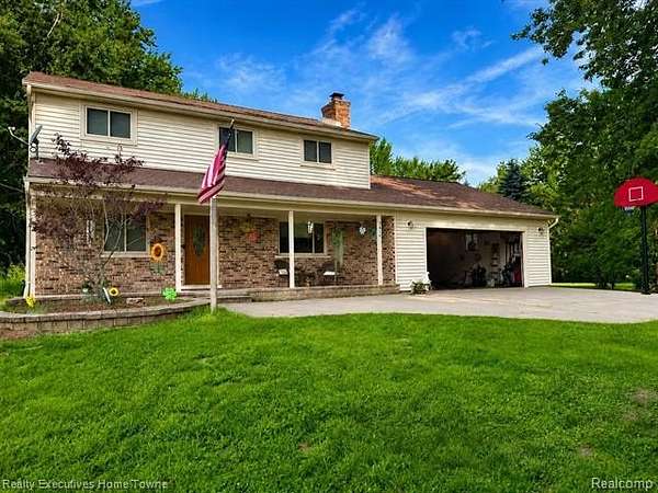 2 Acres of Land with Home for Sale in Columbus Township, Michigan