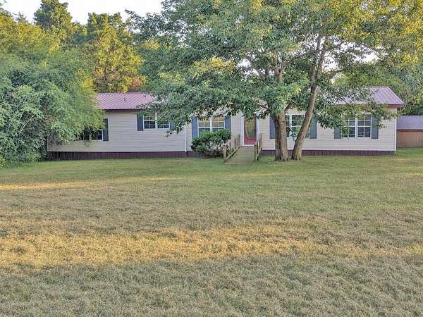 3 Acres of Land with Home for Sale in Loretto, Tennessee
