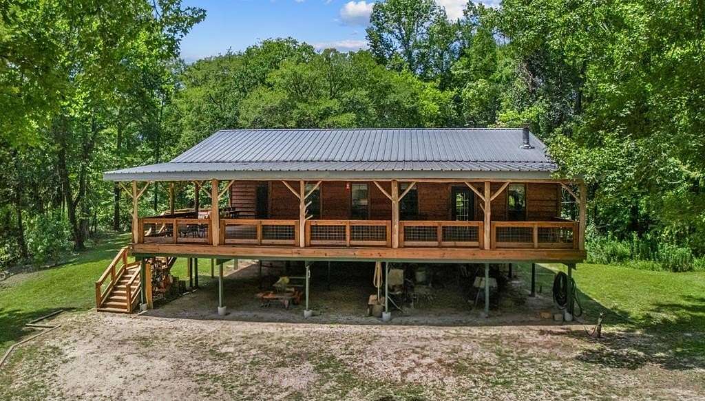 8.47 Acres of Land with Home for Sale in Colmesneil, Texas