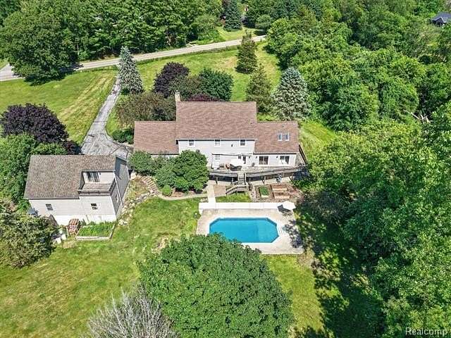 2.48 Acres of Land with Home for Sale in Hamburg Township, Michigan
