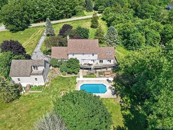 2.48 Acres of Land with Home for Sale in Hamburg Township, Michigan