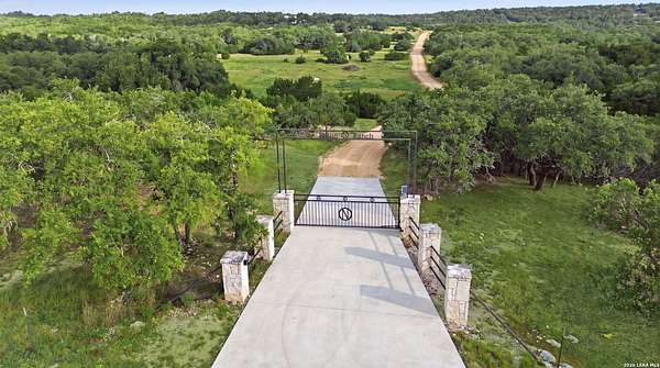 51.6 Acres of Agricultural Land with Home for Sale in Blanco, Texas