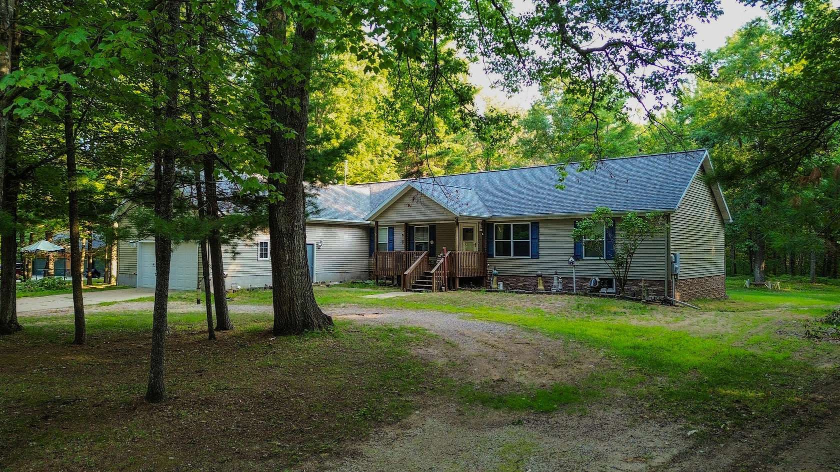 13.1 Acres of Recreational Land with Home for Sale in Prudenville, Michigan
