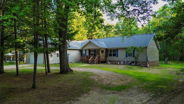 12.4 Acres of Recreational Land with Home for Sale in Prudenville, Michigan