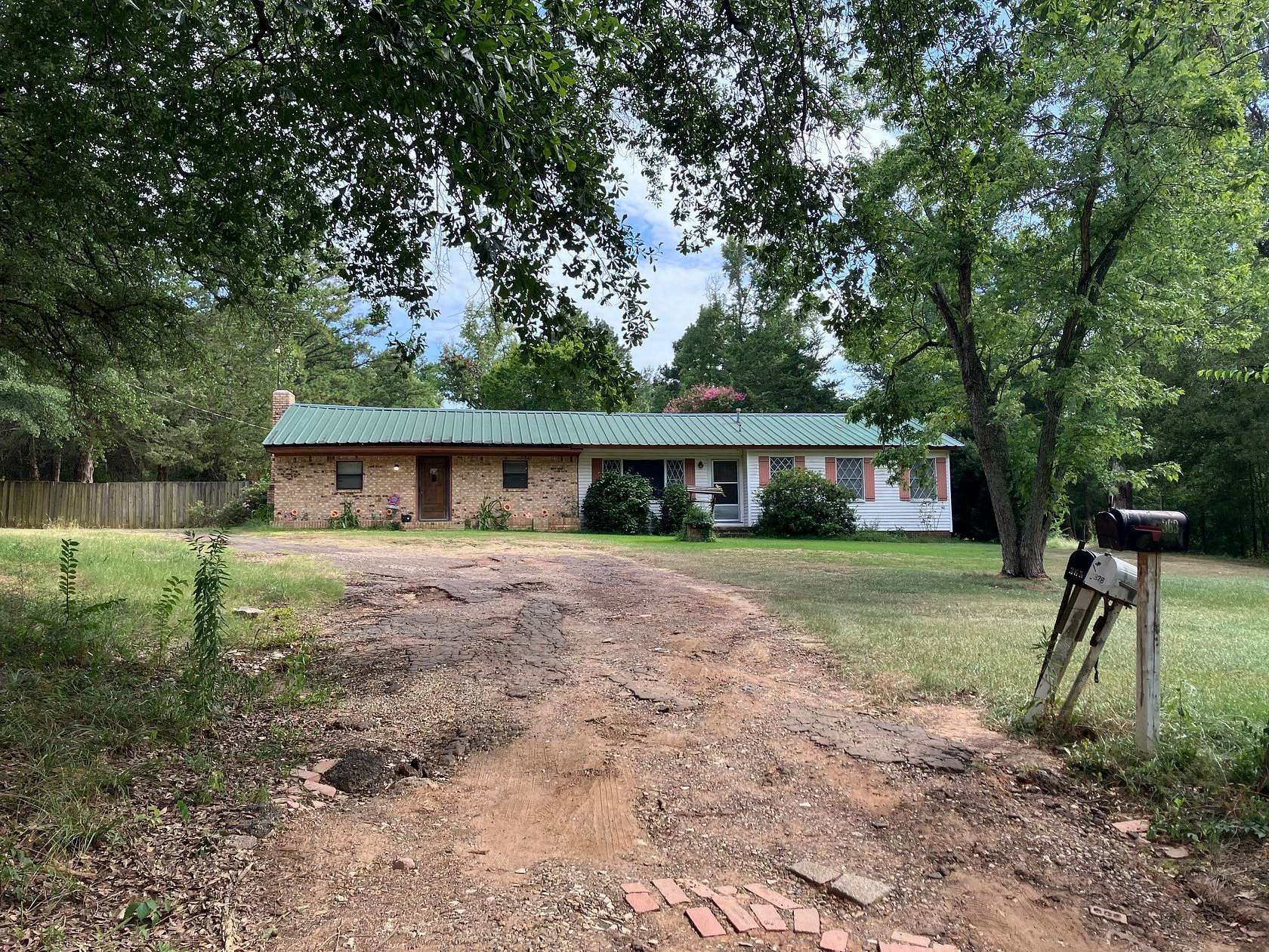 15.7 Acres of Land with Home for Sale in Mount Pleasant, Texas