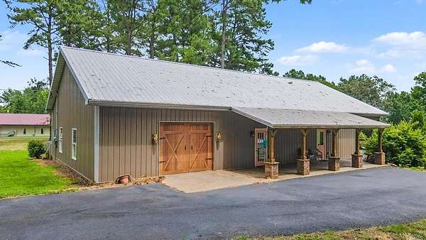 5 Acres of Land with Home for Sale in Puryear, Tennessee