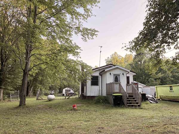 1.8 Acres of Land with Home for Sale in Harrison, Michigan
