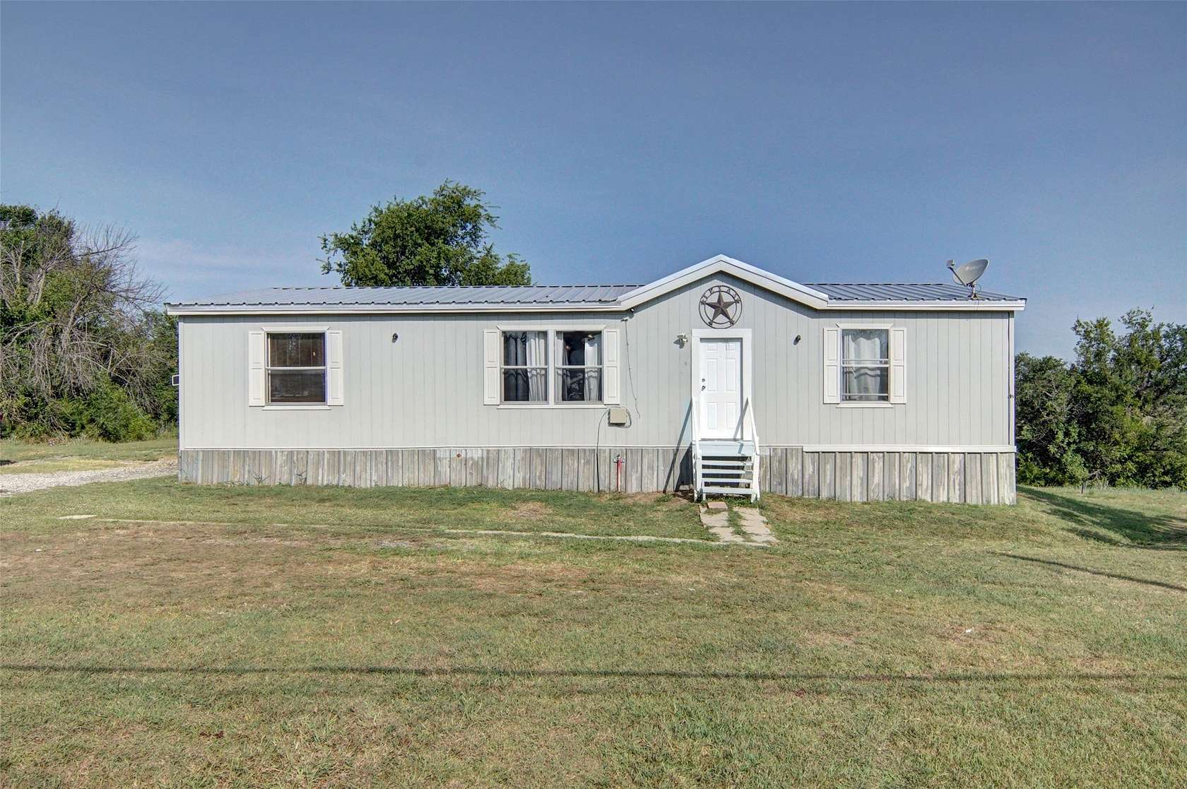 5.7 Acres of Land with Home for Sale in Weatherford, Texas