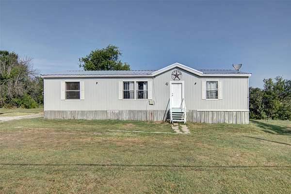 5.7 Acres of Land with Home for Sale in Weatherford, Texas