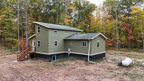 10 Acres of Land with Home for Sale in Frederic, Wisconsin