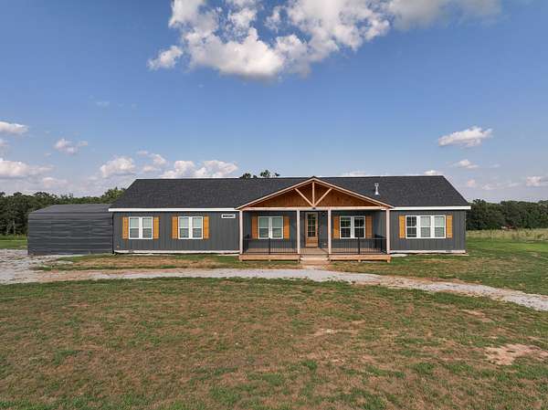 35.1 Acres of Land with Home for Sale in El Dorado Springs, Missouri