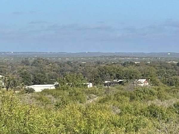63 Acres of Agricultural Land with Home for Sale in San Saba, Texas