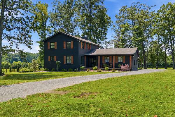 2 Acres of Land with Home for Sale in Cottontown, Tennessee