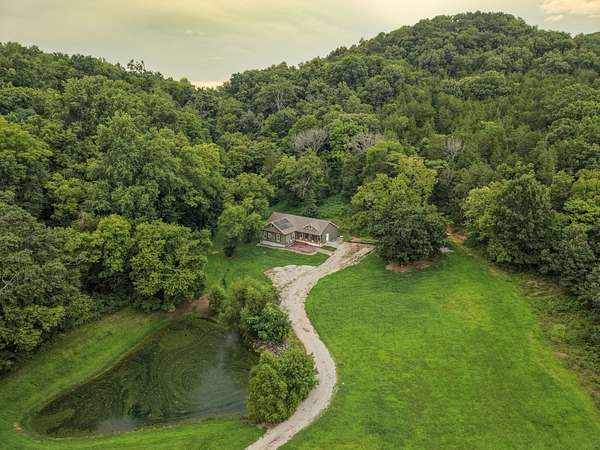 15.7 Acres of Land with Home for Sale in College Grove, Tennessee